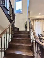 Stairs featuring ornamental molding and baseboards - 