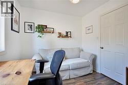 Office space featuring dark wood-type flooring - 