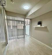 Sliding Patio doors to Terrace, LED lighting  on 9' ceilings and light wood-style laminate floors - 