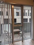 Custom Wall-to-wall blinds split in Bedroom for easy window access - 