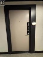 B121 - Ground Level Entrance with well-lit hallway - 