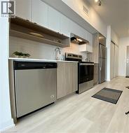 Neutral Decor with B/I Dishwasher & easy-care Laminate Flooring - 