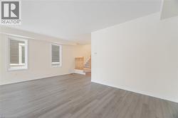 Unfurnished room with light wood-type flooring - 