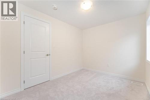 Spare room with light carpet - 109 Molozzi Street, Erin, ON - Indoor Photo Showing Other Room