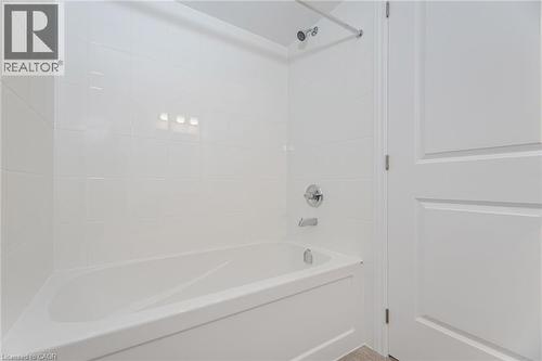 Bathroom with shower / bathing tub combination - 109 Molozzi Street, Erin, ON - Indoor Photo Showing Bathroom