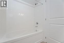 Bathroom with shower / bathing tub combination - 