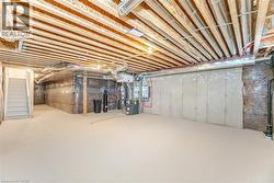 Basement featuring heating unit - 