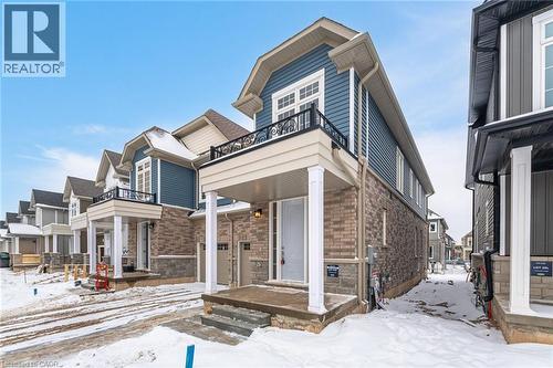 View of front of property with a balcony - 109 Molozzi Street, Erin, ON - Outdoor