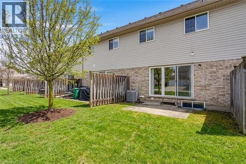 AI generated - 310 Fallowfield Drive, Kitchener, ON - Outdoor With Deck Patio Veranda With Exterior