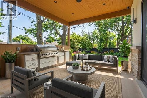 Heated Covered Patio with virtual staging - 427 Pine Cove Road, Burlington, ON - Outdoor With Deck Patio Veranda With Exterior