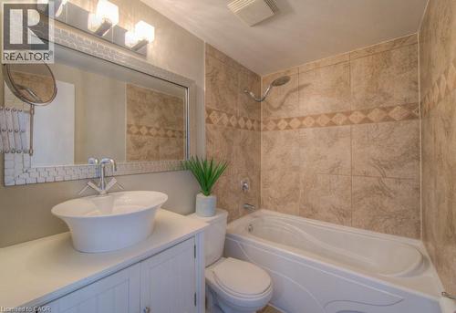 Bathroom with vanity and shower / bathtub combination - 46 Guerin Avenue, Kitchener, ON - Indoor Photo Showing Bathroom