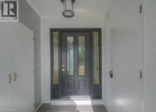 Doorway to property with stucco siding - 46 Guerin Avenue, Kitchener, ON - Indoor Photo Showing Other Room