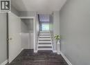 Staircase with wood tiled floors and a textured ceiling - 46 Guerin Avenue, Kitchener, ON  - Indoor Photo Showing Other Room 