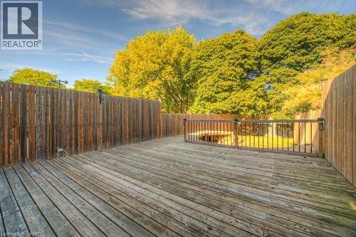 Wooden deck featuring a fenced backyard - 46 Guerin Avenue, Kitchener, ON - Outdoor With Deck Patio Veranda