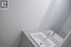 Half bathroom featuring vanity - 