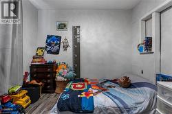 Bedroom featuring wood finished floors - 