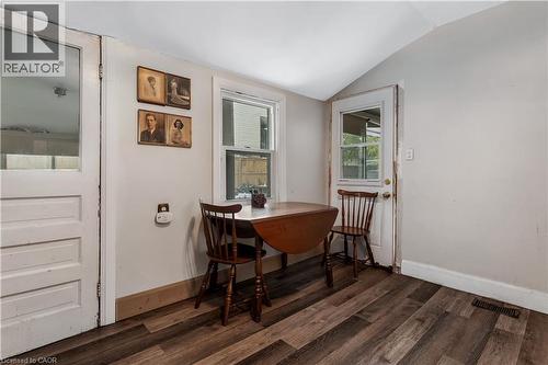 Dining room featuring vaulted ceiling and dark wood-type flooring - 193 Locke Street N, Hamilton, ON - Indoor Photo Showing Other Room