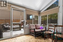 Sunroom featuring vaulted ceiling - 