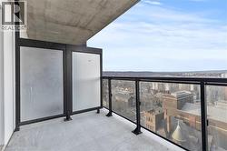 Balcony featuring a view of city - 