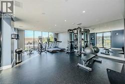 Exercise room featuring a wall of windows - 