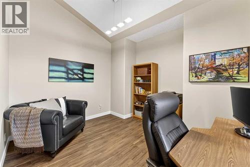 large flex room with cantilever is formal dining room, or why not indulge in a true home office? - 509 Riverview Place Se, Calgary, AB - Indoor Photo Showing Office