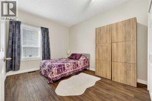 Second bedroom on the main floor - 509 Riverview Place Se, Calgary, AB - Indoor Photo Showing Bedroom
