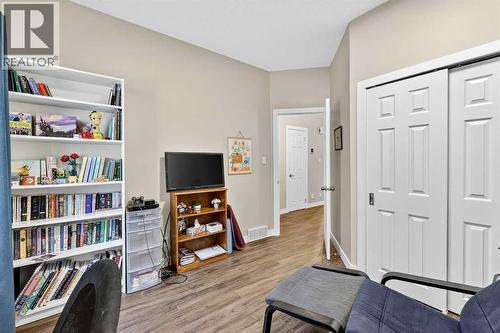 A good size for a bedroom, but would also make a private home office - 509 Riverview Place Se, Calgary, AB - Indoor