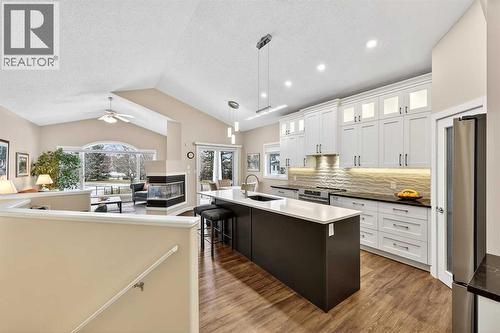 Vaulted ceilings add to the spaciousness of this home - 509 Riverview Place Se, Calgary, AB - Indoor Photo Showing Kitchen With Upgraded Kitchen