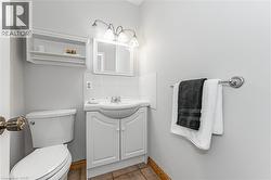 Bathroom with vanity and toilet - 