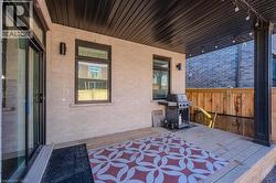 View of patio / terrace with a grill and a deck - 