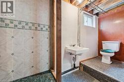 Full bath with a shower stall and toilet - 