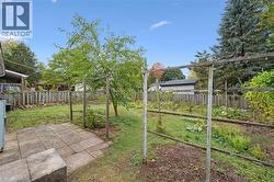 Fenced backyard featuring a patio - 