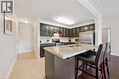1440 Gordon Street Unit# 122, Guelph, ON - Indoor Photo Showing Kitchen With Stainless Steel Kitchen With Double Sink