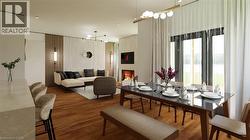 Dining room with a large fireplace, wood finished floors, and a chandelier - 