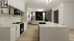 Kitchen featuring open floor plan, white cabinets, an island with sink, light stone counters, and light wood-style flooring - 