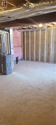 Unfinished below grade area featuring heating unit - 17 Renfrew Trail, Welland, ON - Indoor Photo Showing Other Room