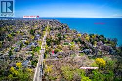 Aerial view of residential area with a nearby body of water - 