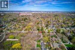 Aerial view of property's location with nearby suburban area - 