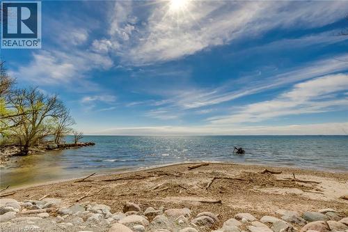 View of water feature with a beach view - 4306 Lakeshore Road, Burlington, ON - Outdoor With Body Of Water With View