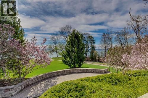 View of home's community with a yard - 4306 Lakeshore Road, Burlington, ON - Outdoor With View