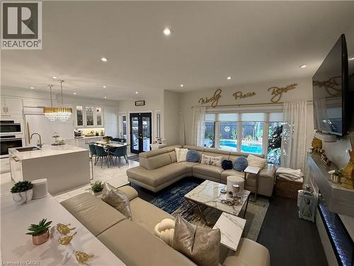 Living room featuring recessed lighting and french doors - 11 Donatello Court, Hamilton, ON - Indoor Photo Showing Living Room
