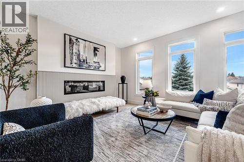 83 Dunnigan Drive, Kitchener, ON - Indoor Photo Showing Living Room With Fireplace