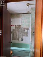 Some tiles coming off the wall - 