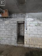 Entrance to root cellar in workshop - 