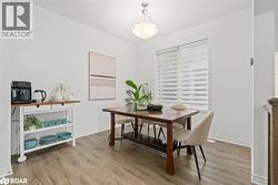 Dining area with light wood-style floors - 