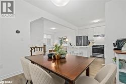 Dining area featuring light wood-style floors - 