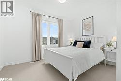 Bedroom with baseboards and light carpet - 