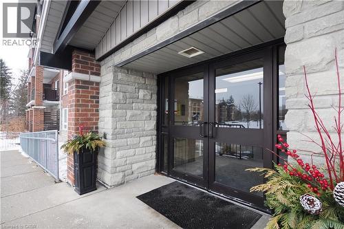Doorway to building main entrance. - 645 St. David Street S Unit# 412, Fergus, ON - Outdoor