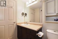 Bathroom vanity with pull out drawers and single sink. - 