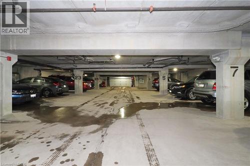 View of undergroung parking garage - 645 St. David Street S Unit# 412, Fergus, ON - Indoor Photo Showing Garage